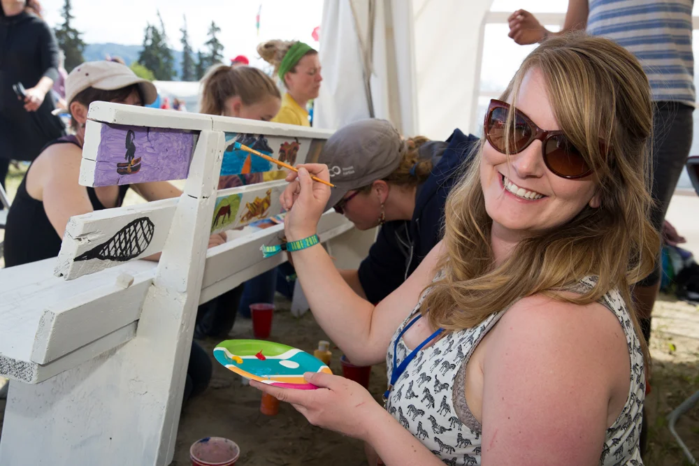 Atlin Arts & Music Festival Holly working on bench